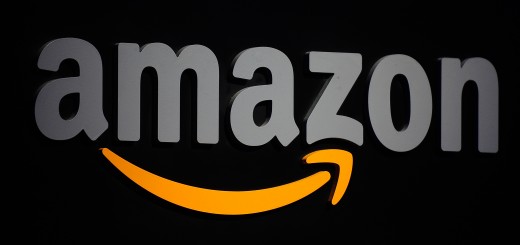 The Amazon logo is seen on a podium duri
