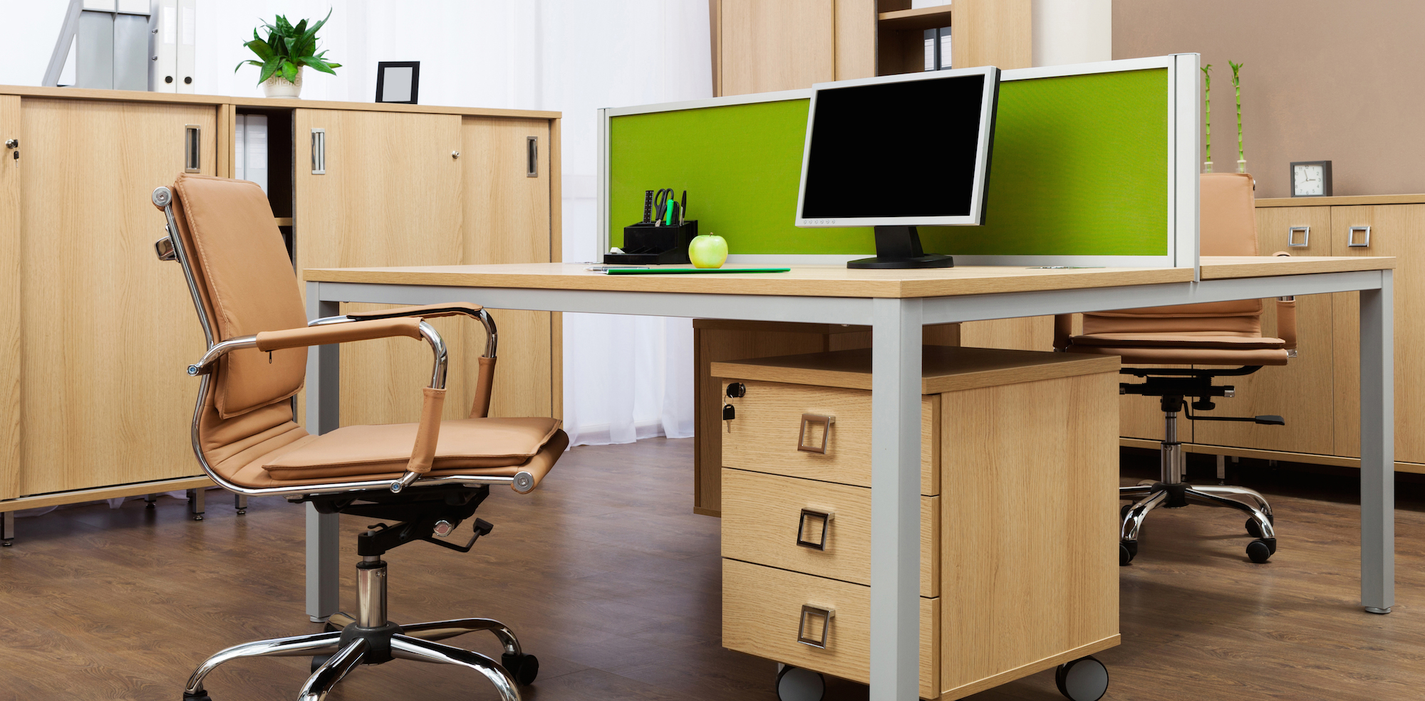 Modern office desk work ideas with comfortable swivel chairs.